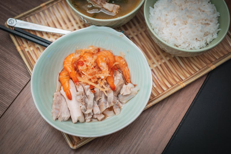 Sweet Pork Rice Bowl with slow-roasted pork and toppings
