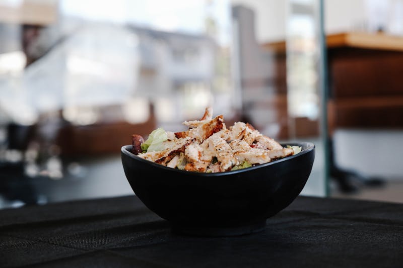 Grilled Chicken Tostada Salad with romaine and tortilla strips