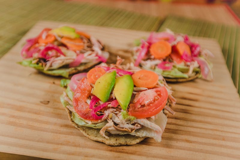 Sweet Pork Tostada Salad with slow-roasted pork and greens