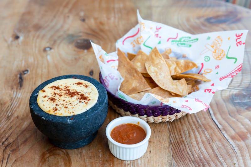 Queso dip with warm tortilla chips